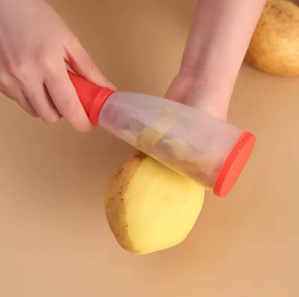 Éplucheur avec récipient
